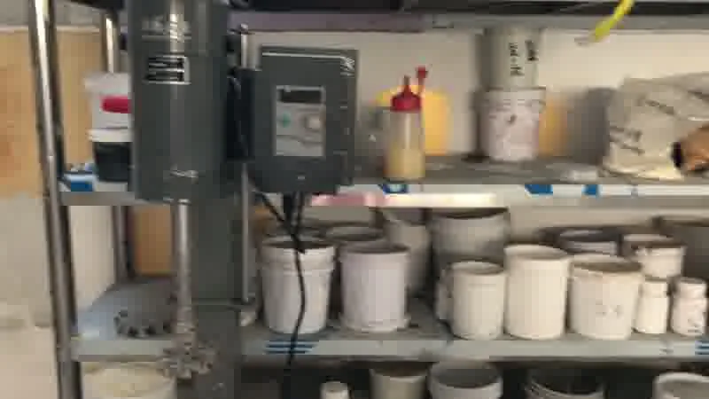 Lab glassware and reagent bottles on the bench