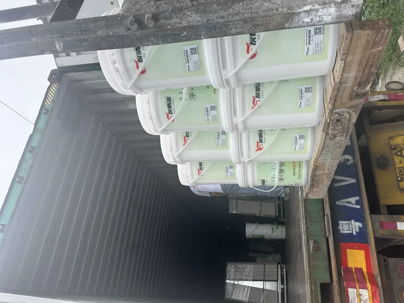Exterior-wall pails loaded into an export container
