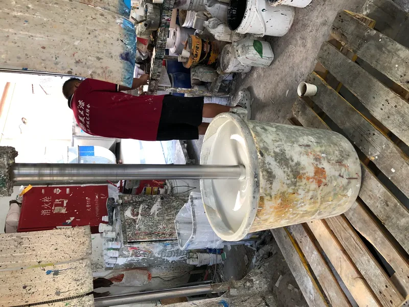 Operator at the mixing tank during batch make-up