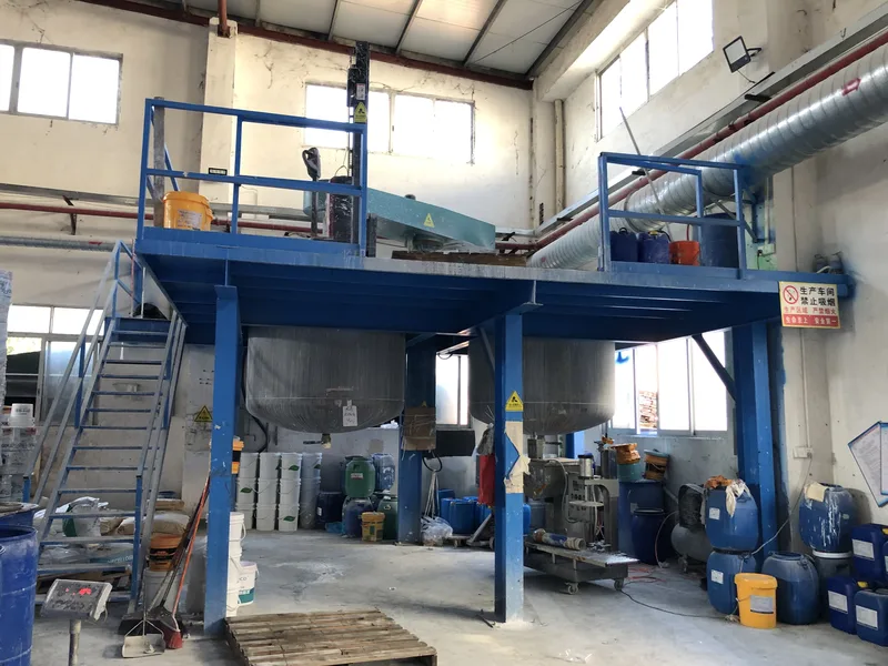 Twin reactors on the mezzanine platform — the heart of the water-based line