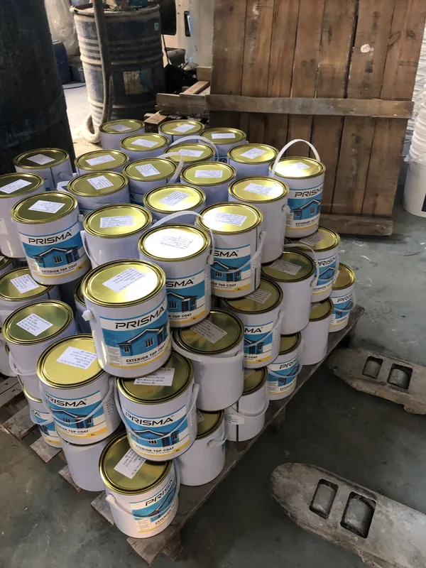 Racking with labelled containers in the warehouse
